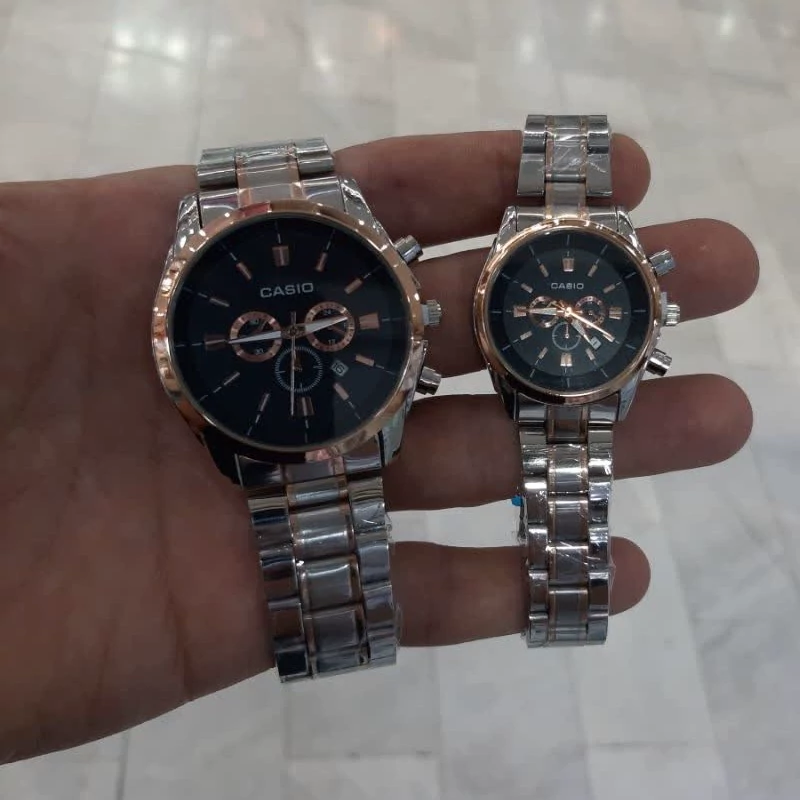 ساعت ست کاسیو طرح س موتوره بند دو رنگ نقره ای رزگلد قاب رزگلد صفحه مشکی